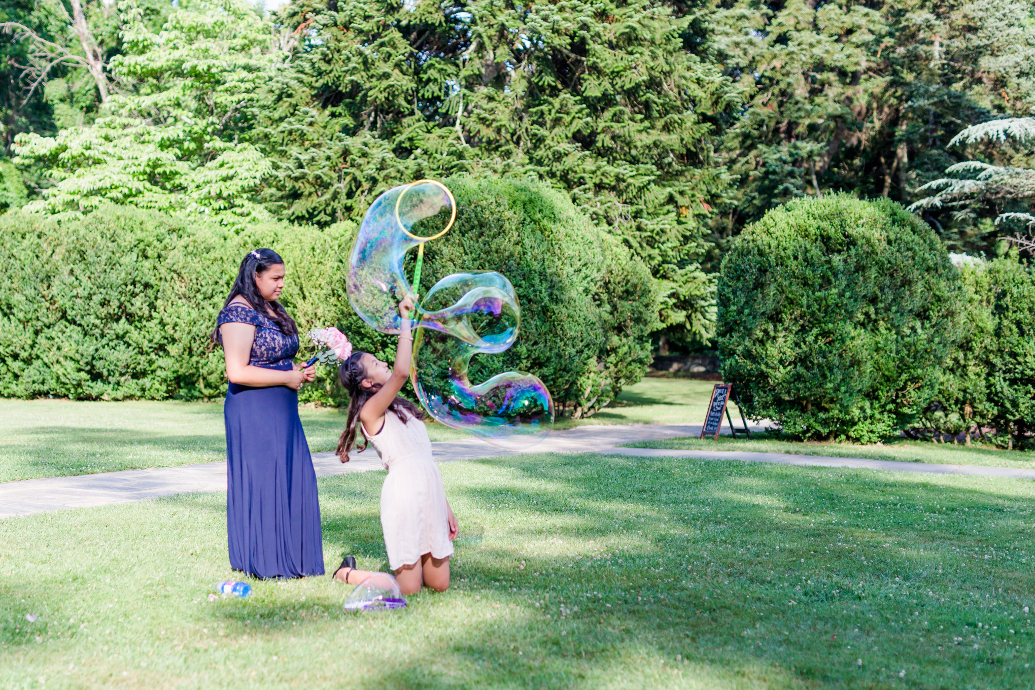 elegant Rust Manor House wedding, alternative wedding cocktail hour, alternative cocktail hour, game time, outdoor games, wedding games, Rust Manor House, colonial house, blowing bubbles