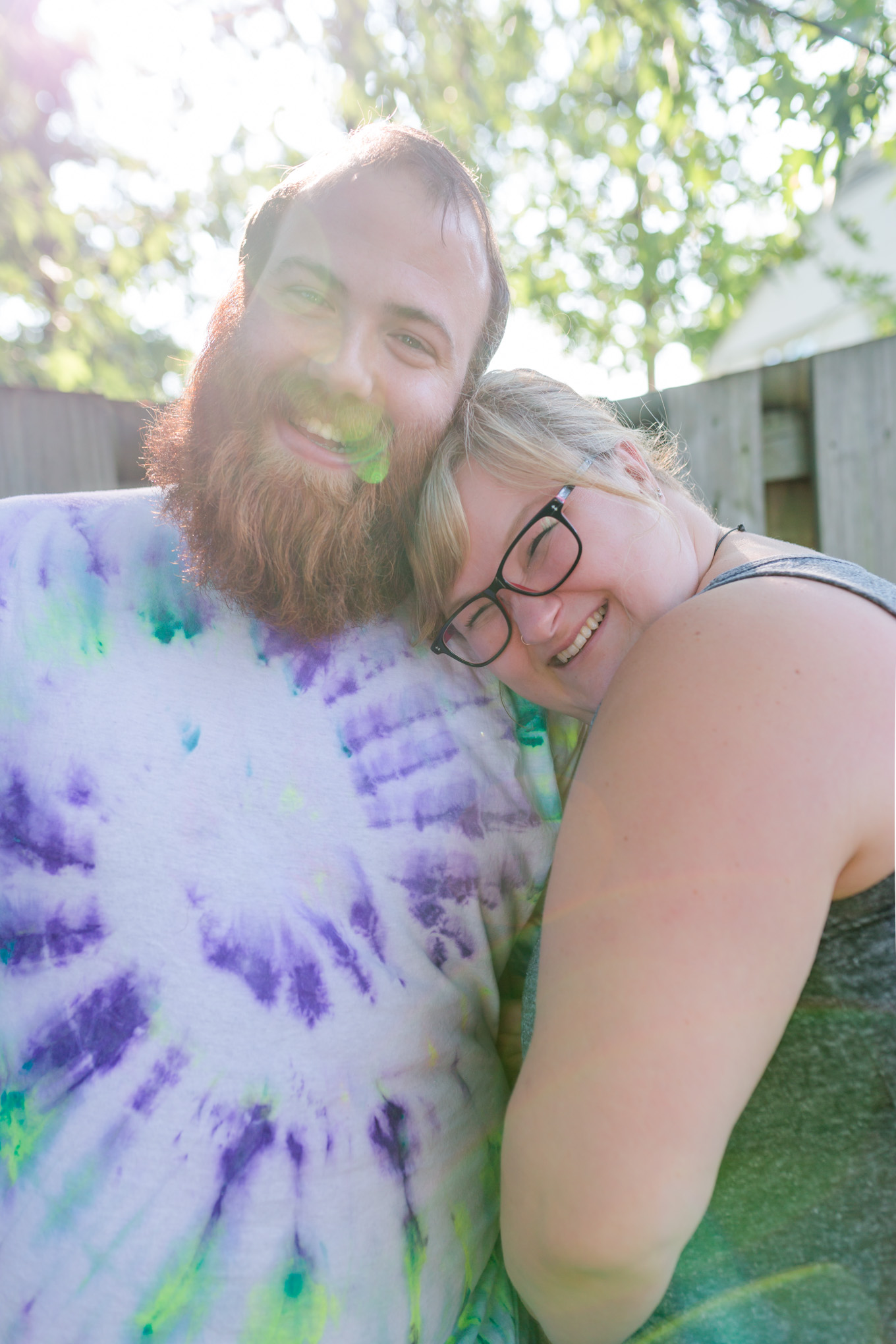 your own risk, married couple, mom and dad, tie died shirt, tie dye, glasses, bearded man, magic hour, summertime, birthday party