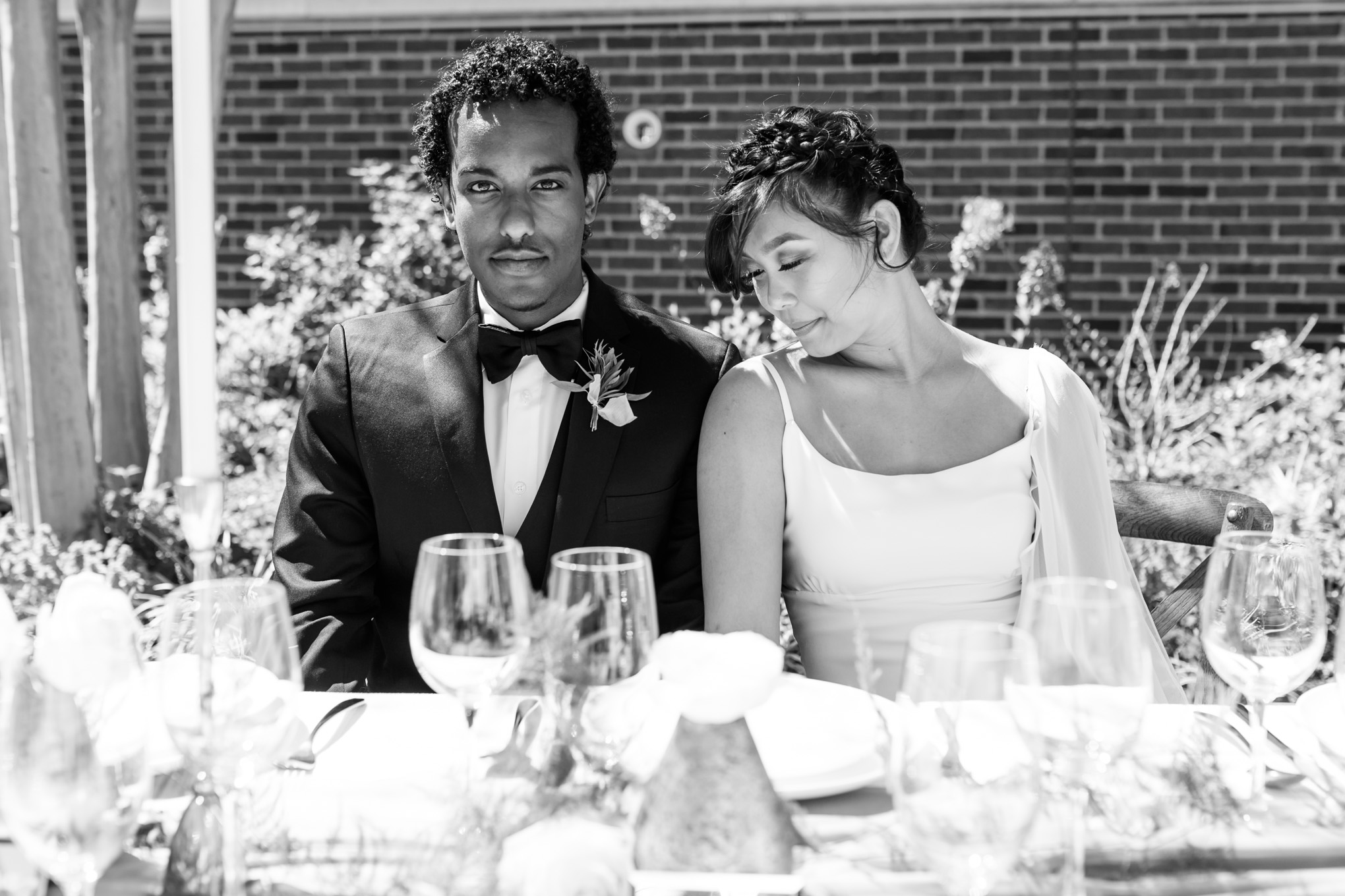modern minimalist wedding inspiration, black and white photography, bride and groom, tuxedo, up do, Old Town Alexandria, hotel wedding, styled shoot, modern wedding, minimalist wedding, tablescape