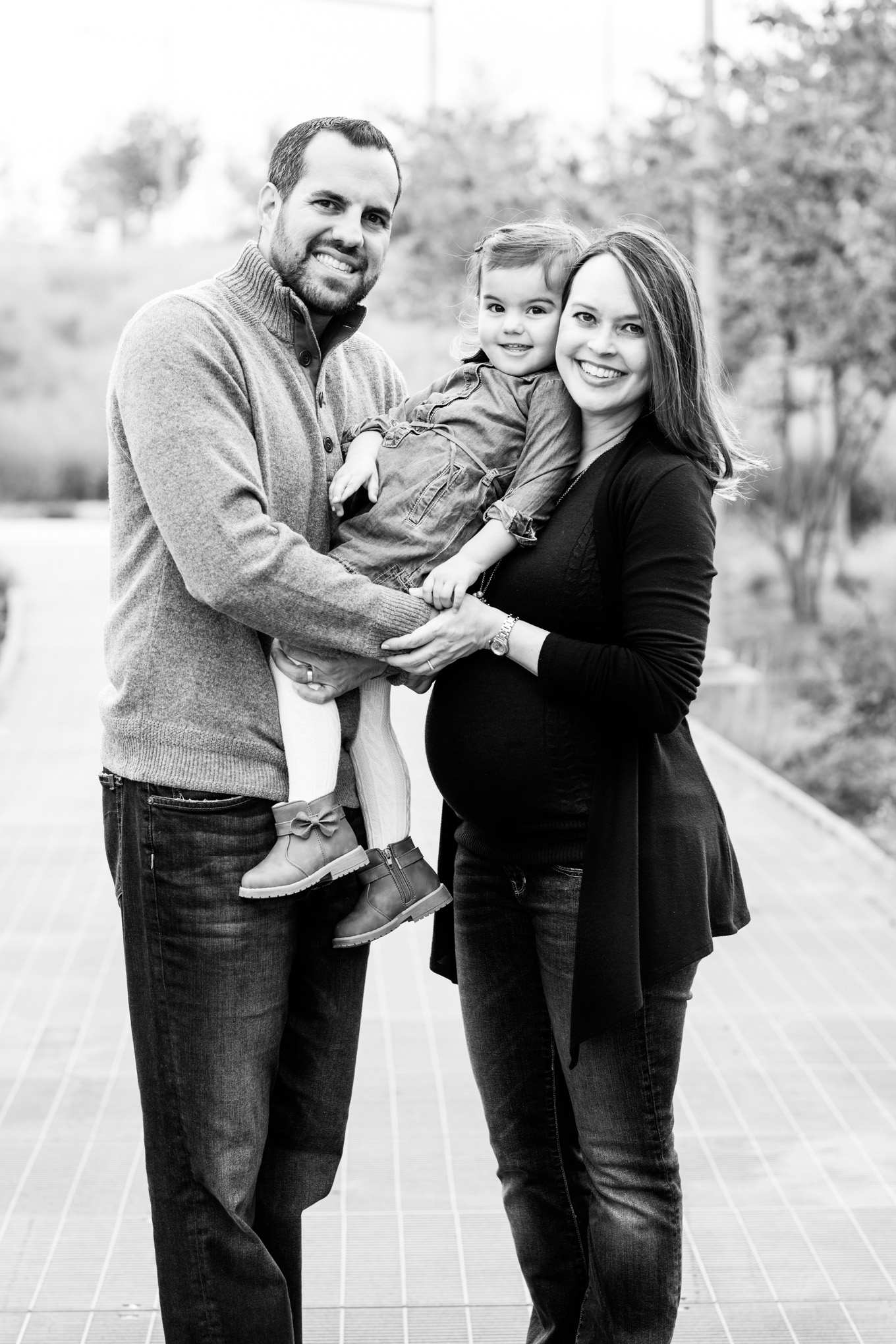 long bridge park family photos, family of three, toddler, little girl, baby bump, maternity photos, outdoor photos, holiday portraits, family portraits, northern Virginia, magic hour portraits, black and white family portrait