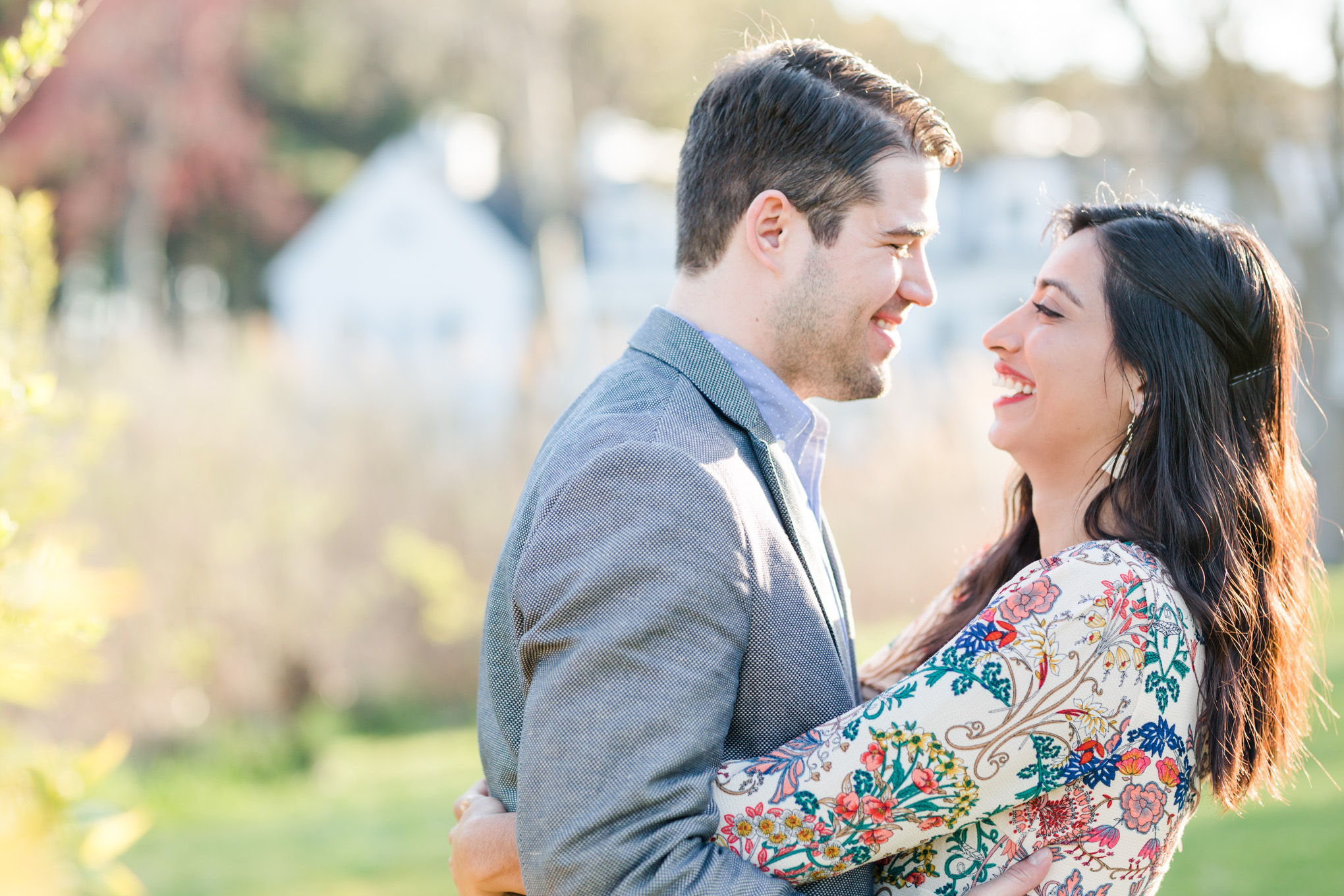 Inn at Perry Cabin, waterfront proposal, surprise proposal, marriage proposal, Maryland waterfront, Maryland eastern shore, spring marriage proposal, floral dress, grey blazer, St. Michaels, relationship goals, happy couple, laughing couple, St. Michaels surprise proposal