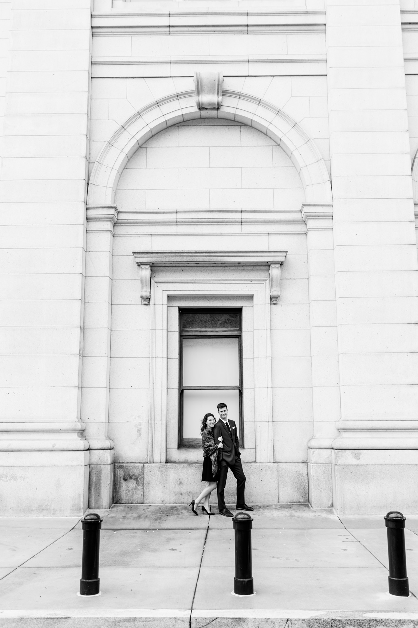 black and white engagement photos, black and white photography, black and white photos, engagement photos, black and white D.C., D.C. engagement photos, classic engagement photos, traditional engagement photos, engagement photos poses, classic architecture, D.C. architecture, Union Station D.C., Union Station, engaged couple, relationship goals, joyful couple, black and white sessions, epic portrait