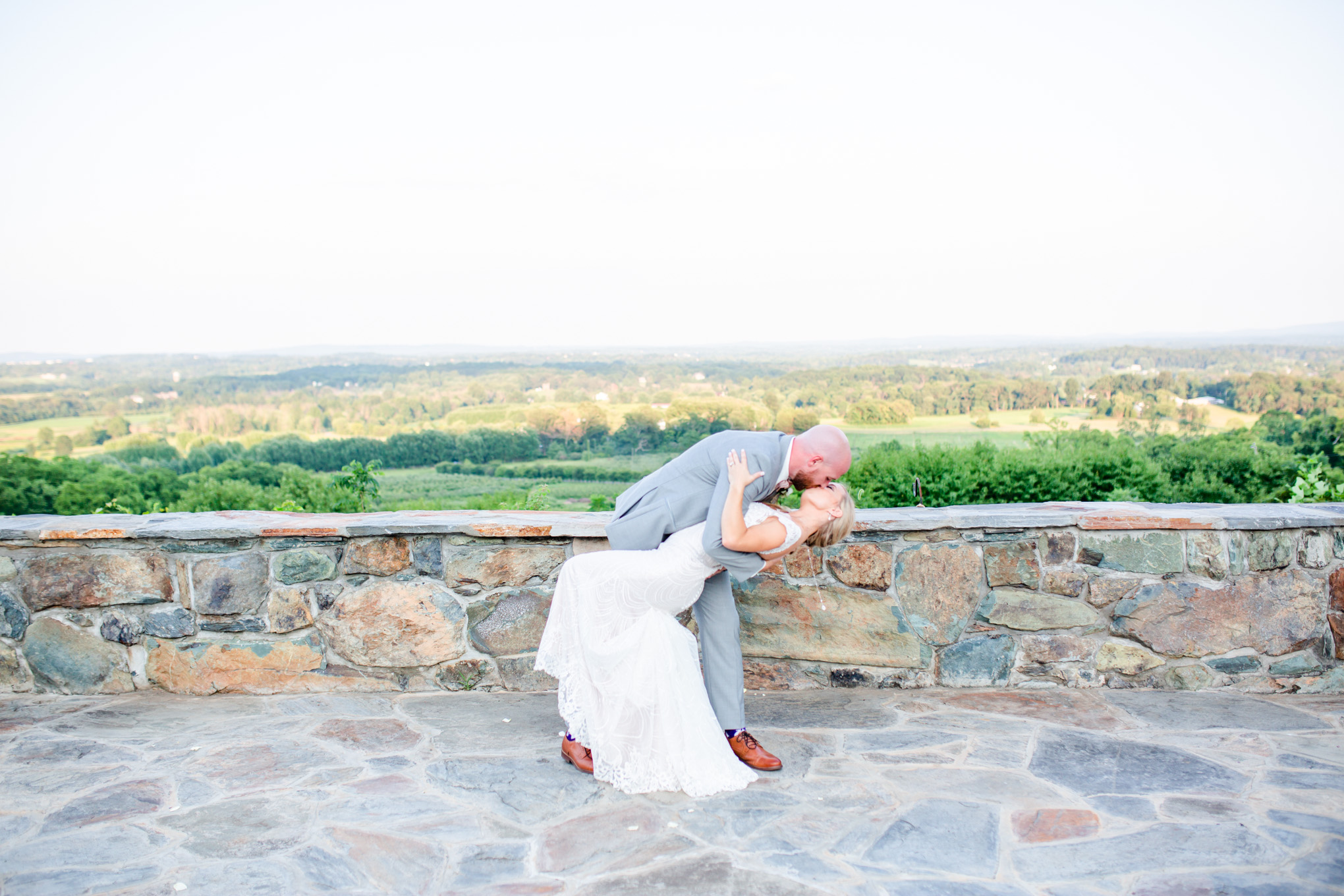 romantic Bluemont Vineyard wedding, Bluemont Vineyard, romantic wedding colors, Loudoun County wedding, Loudoun County wedding photographer, Loudoun County wedding venues, non-denominational wedding ceremony, Rachel E.H. Photography, Virginia wedding, rural wedding, rustic wedding, romantic wedding, romantic aesthetic, outdoor wedding, portraits with a view, newlywed portraits, dramatic kiss