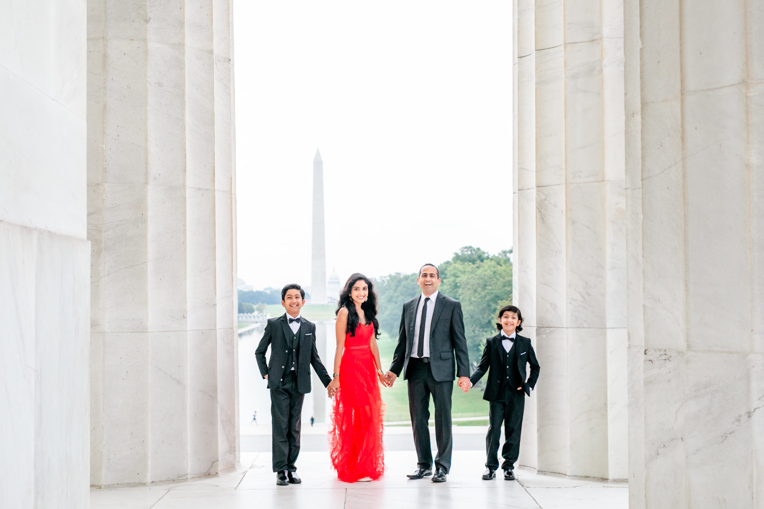 formal Lincoln Memorial family photos, formal family portraits, Lincoln Memorial portraits, Washington DC family photos, National Mall portraits, Rachel E.H. Photography, formal family photos, DC photographer, family of four, red dress, black tie family photos