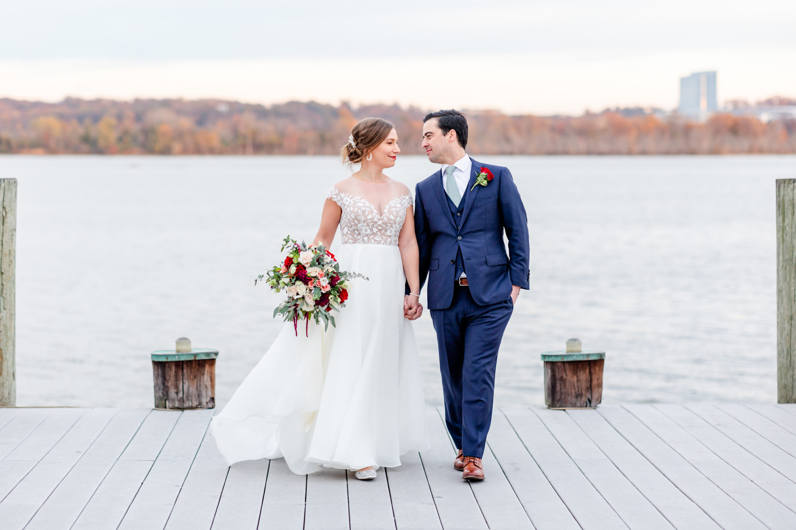 Lorien Alexandria winter wedding, Old Town Alexandria wedding, Alexandria Virginia wedding, DC micro wedding, northern Virginia wedding photographer, Alexandria Virginia wedding photographer, DC wedding photographer, winter wedding aesthetic, Rachel E.H. Photography, bride and groom holding hands on dock, Alexandria waterfront