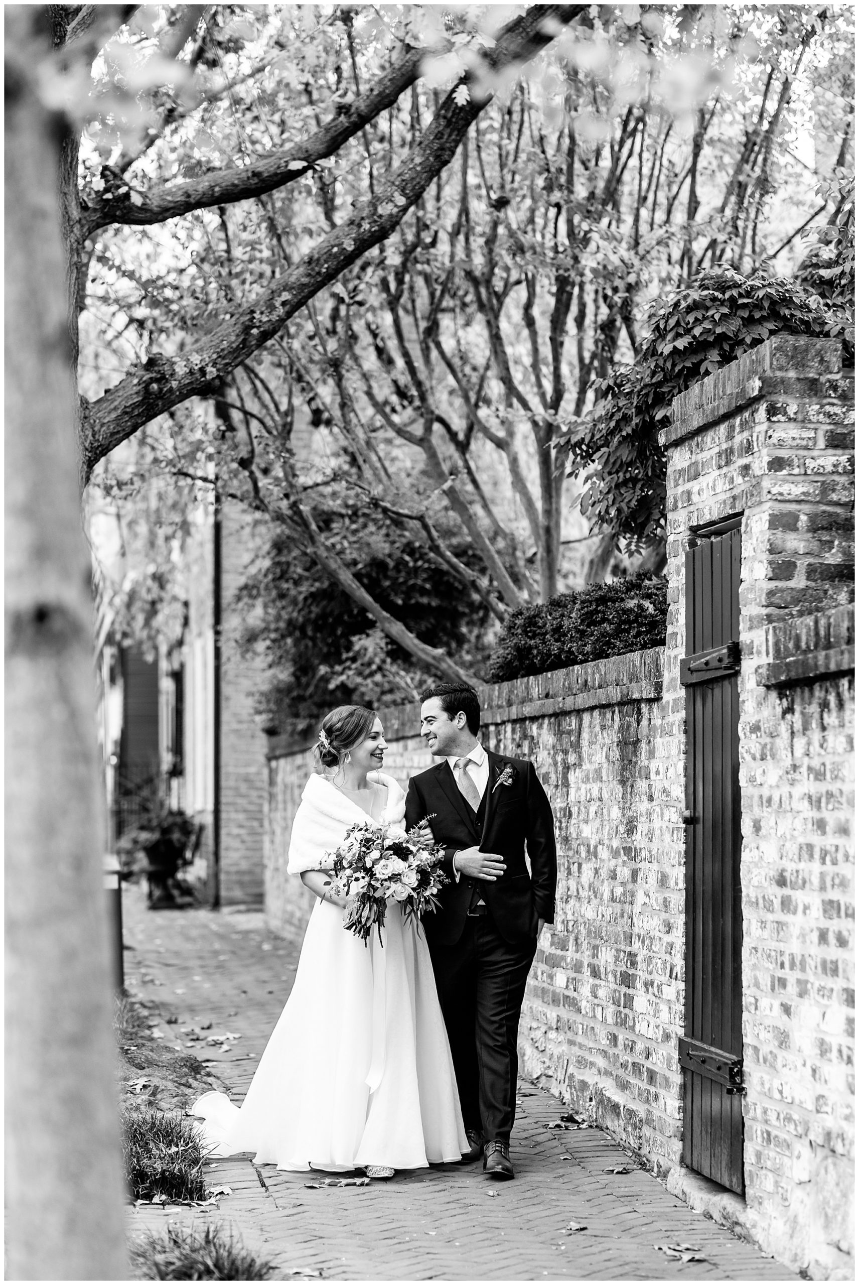 Lorien Alexandria winter wedding, Old Town Alexandria wedding, Alexandria Virginia wedding, DC micro wedding, northern Virginia wedding photographer, Alexandria Virginia wedding photographer, DC wedding photographer, winter wedding aesthetic, Rachel E.H. Photography, black and white, bride and groom walking down sidewalk