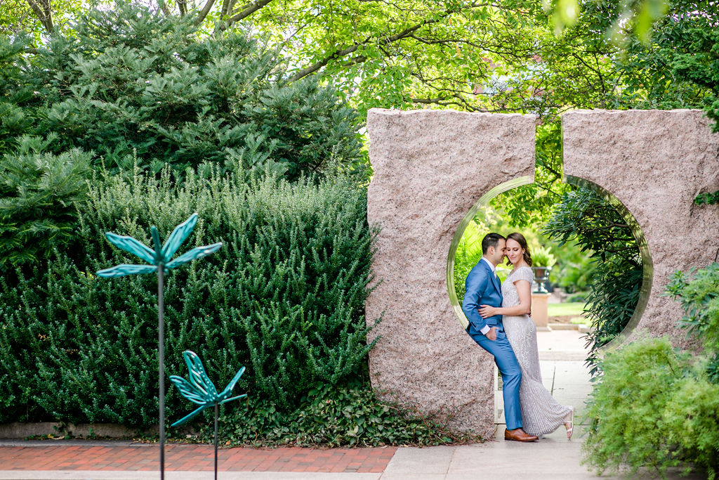 formal DC engagement portraits, Washington DC engagement photos, DC engagement photographer, DC portraits, BHLDN dress, autumn engagement portraits, formal engagement photos, formal portraits, Rachel E.H. Photography, blue-green engagement ring, couple smiling, couple in the Smithsonian Castle gardens