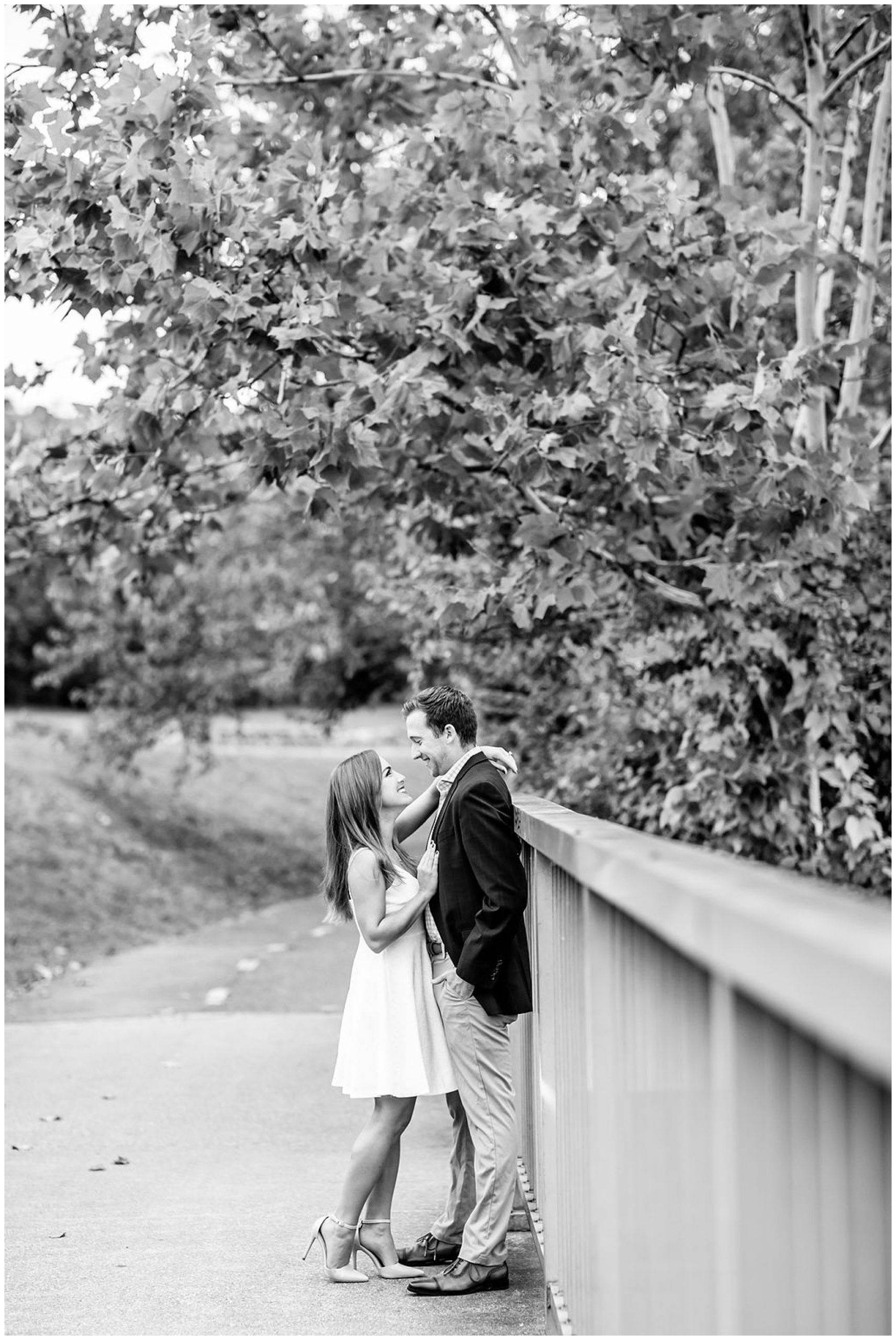 GW Parkway engagement photos, Roosevelt Island engagement photos, Mt. Vernon Trail engagement photos, Arlington engagement photos, DC engagement photos, waterfront engagement photos, autumn engagement photos, natural light engagement photos, Rachel E.H. Photography, black and white, man and woman against railing