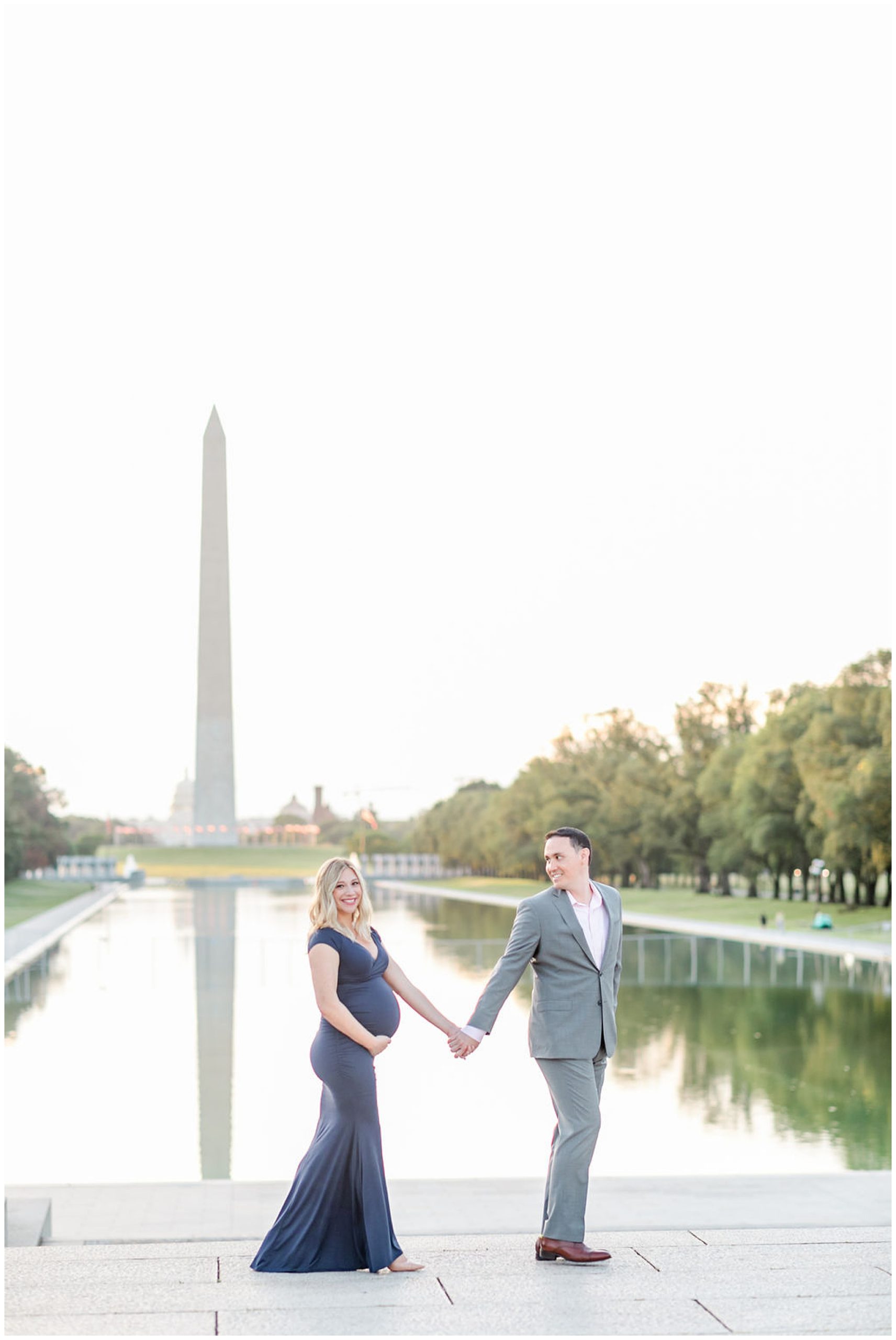 National Mall maternity photos, Lincoln Memorial maternity photos, Constitution Gardens maternity photos, DC maternity photos, DC maternity photographer, classic DC portraits, pregnant couple, natural light maternity photos, Rachel E.H. Photography, couple holding hands from distance