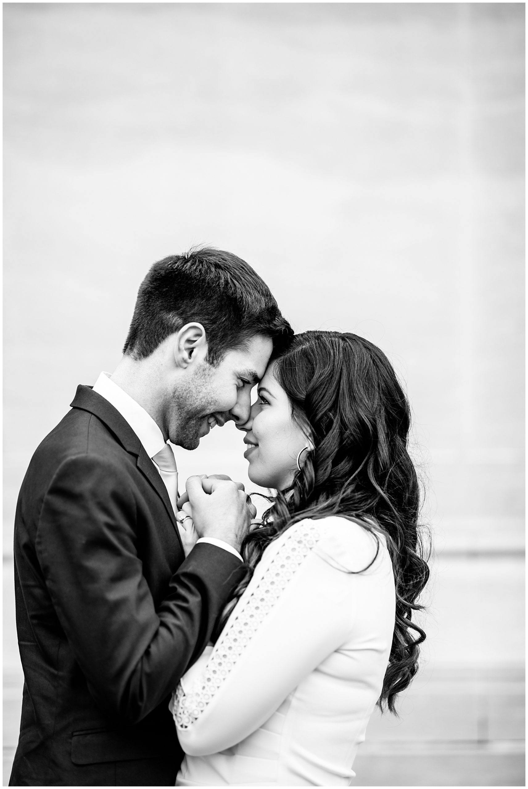 black and white photos, Washington DC photographer, black and white photography, black and white photographer, classic black and white, behind the scenes photography, photography tips, black and white photography tips, Rachel E.H. Photography, couple holding hands at their chests