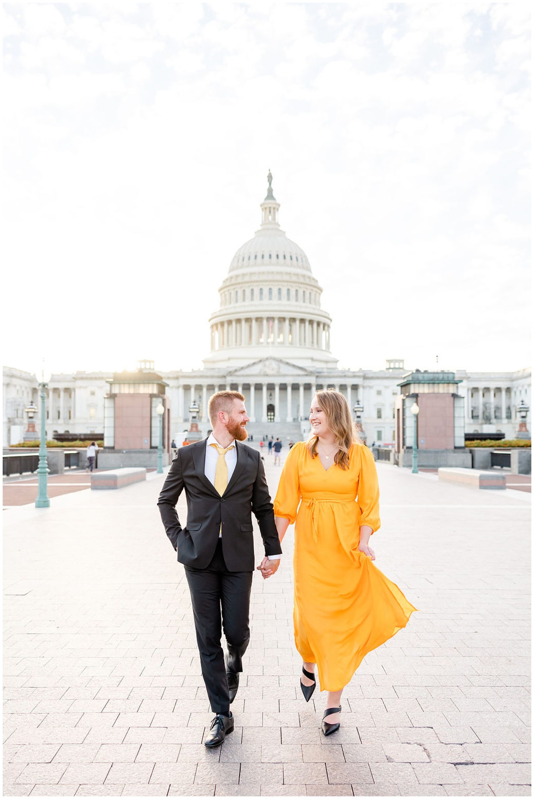 glowing Capitol Hill elopement portraits, Capitol Hill Washington DC, DC elopement portraits, DC elopement photographer, DC wedding photographer, DC portrait photographer, DC photographer, Capitol Hill portraits, autumn portraits, Capitol Hill photographer, Rachel E.H. Photography, couple holding hands, couple smiling at each other, couple walking away from capitol building