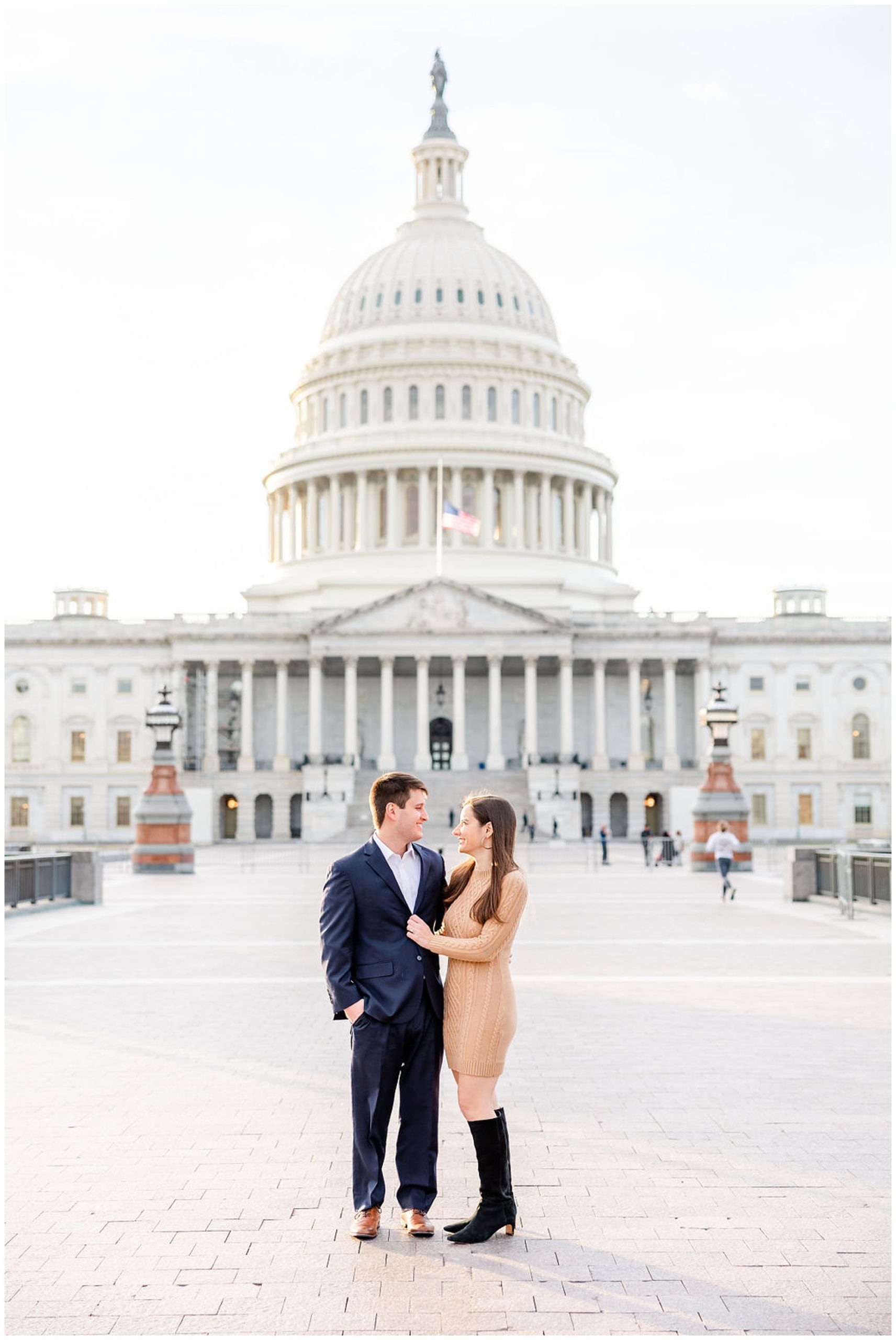 autumn Capitol Hill engagement session, Capitol Hill engagement photos, Capitol Hill photographer, DC engagement photography, DC engagement photographer, DC wedding photography, autumn engagement photos, casual engagement photos, Rachel E.H. Photography, couple smiling at each other, beige sweater dress, couple in front of capitol building