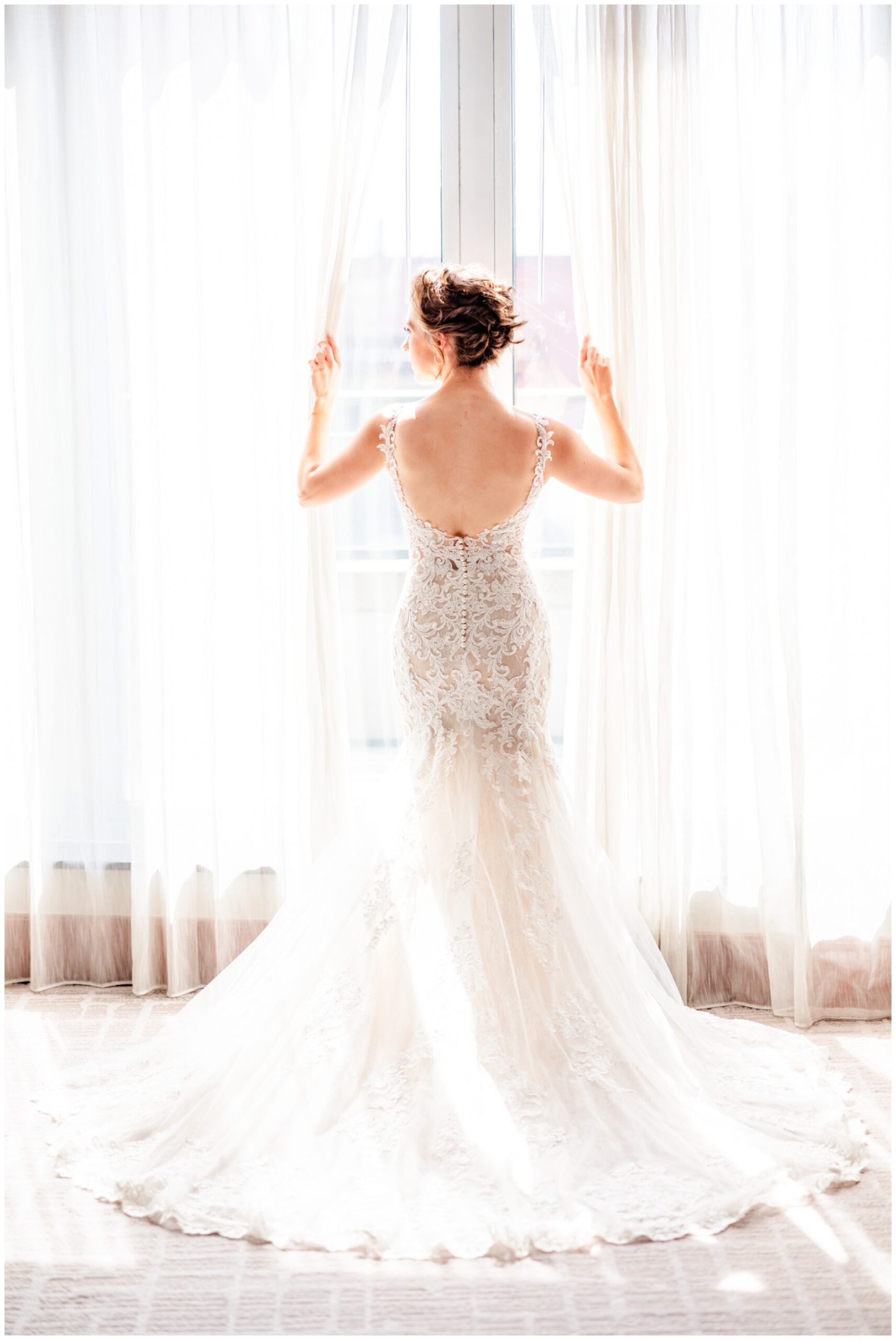 romantic Ritz Carlton Georgetown wedding, summer wedding aesthetic, green and white aesthetic, summer D.C. wedding, D.C. wedding venues, Ritz Carlton wedding, Washington D.C. wedding, romantic wedding aesthetic, Georgetown wedding, Rachel E.H. Photography, D.C. photographer, bride opening window curtains